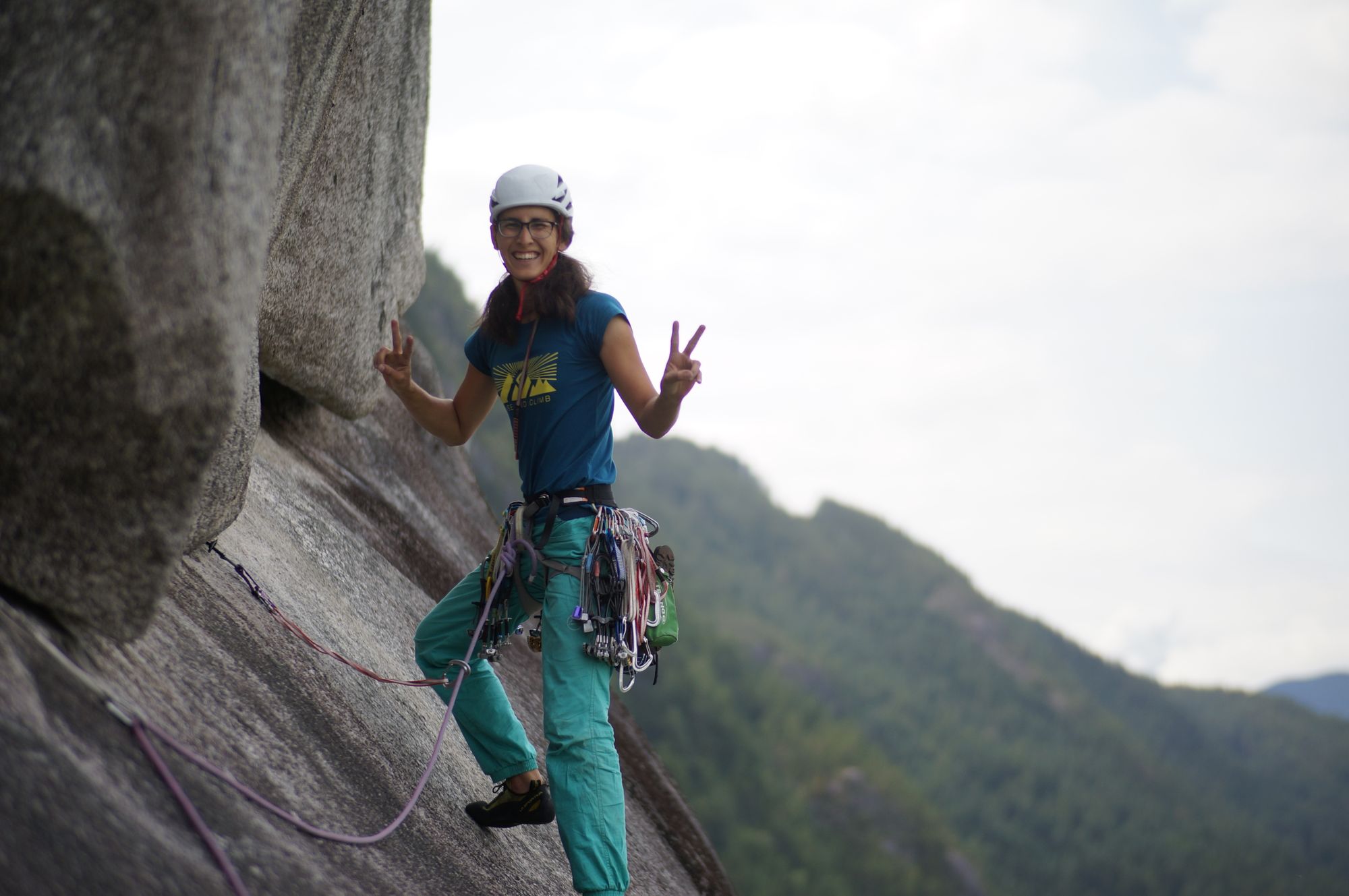 Kwyn on the sky walker traverse slab throwing double peace signs